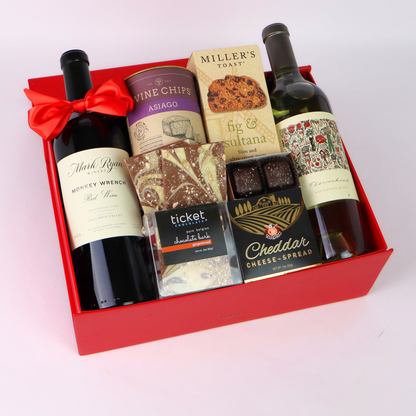 Toast of Washington Wine gift box featuring Columbia valley Mark Ryan wine, wine chips, cheese, crackers, and chocolates.