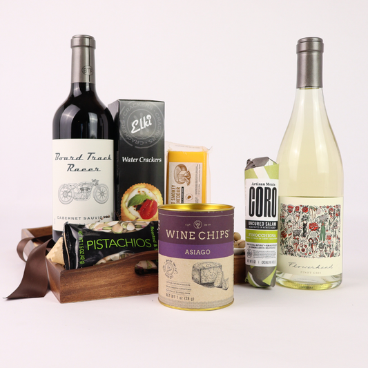 made in Washington wine and snack tray in a wooden tray the high end gift includes pinot gris, cabernet sauvignon, crackers, cheese, smoked muscles, wine chips,  and other snacks