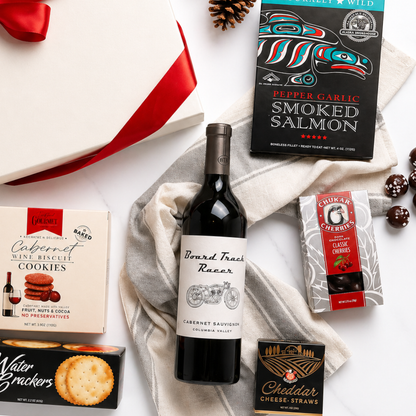 Taste of Washington wine and snack gift box featuring snacks made in the Pacific Northwest.  Mark ryan wine, cheese, crackers, chocolate cherries and smoked salmon.