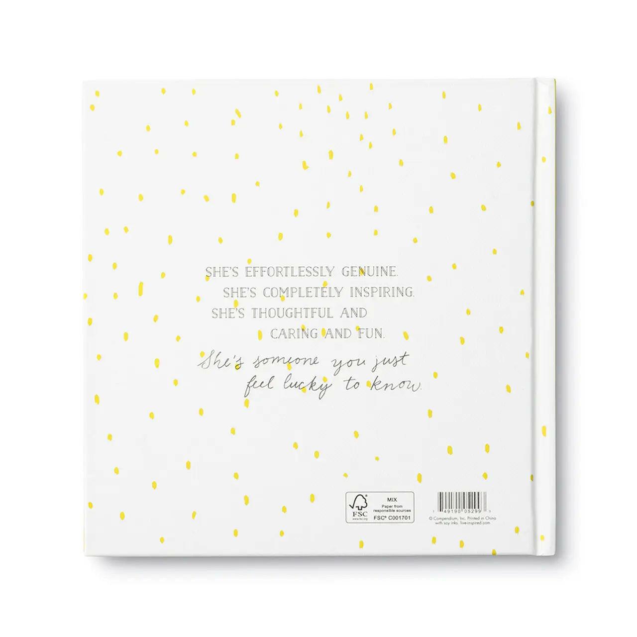 Hardcover gift book titled What Is a Friend? with colorful patterned lettering and pink and yellow abstract accents. A heartfelt friendship keepsake and thoughtful gift for retirement or local PNW gift baskets.