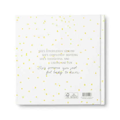 Hardcover gift book titled What Is a Friend? with colorful patterned lettering and pink and yellow abstract accents. A heartfelt friendship keepsake and thoughtful gift for retirement or local PNW gift baskets.